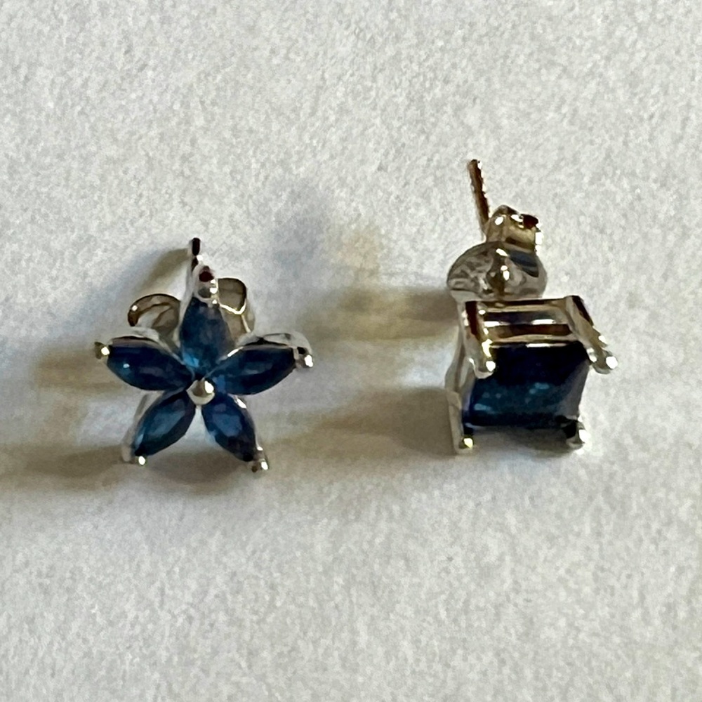 Two purposely mismatched stud earrings